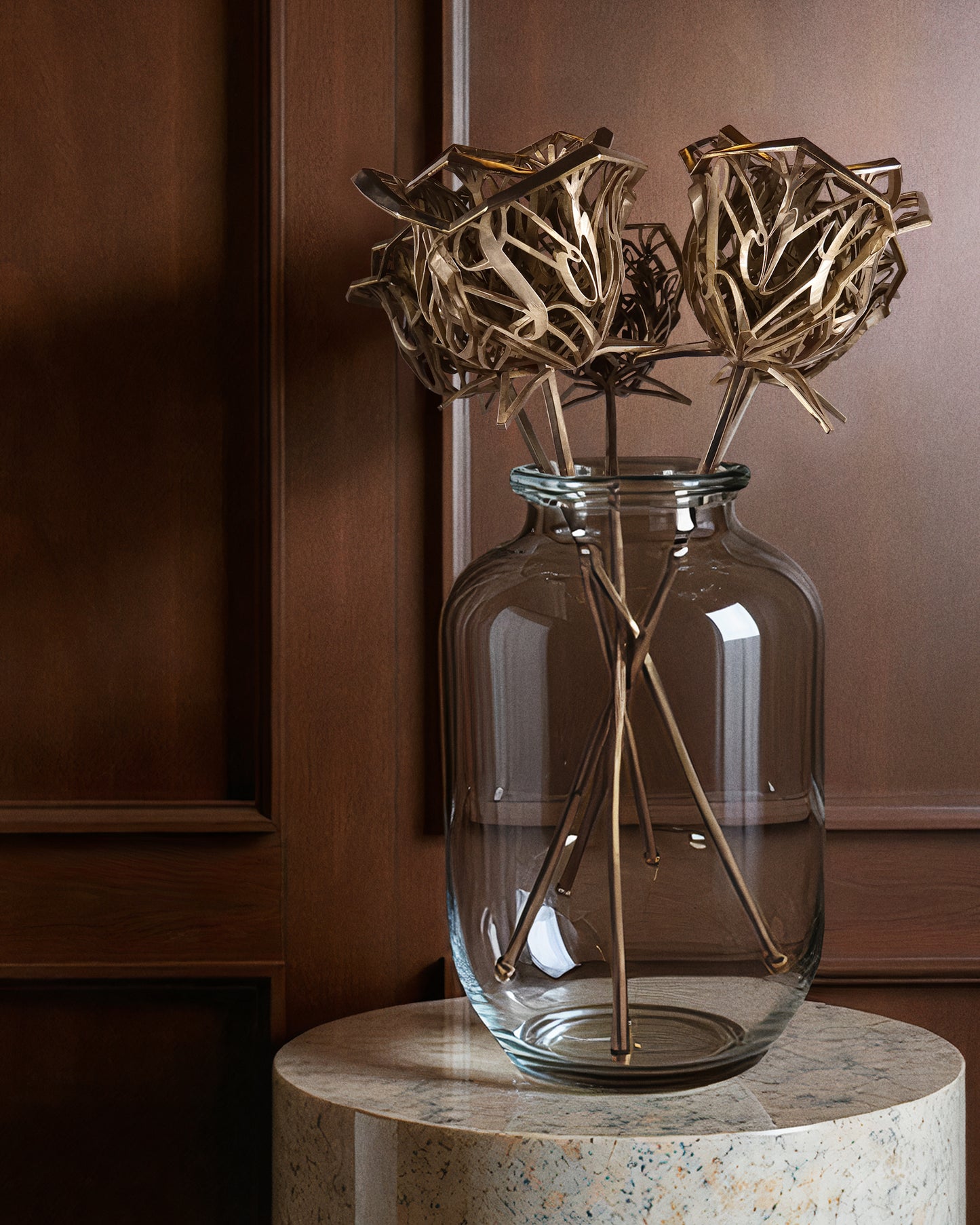 Fine-art bronze rose sculptures displayed in a clear vase on a stone pedestal, luxury interior with wood panel backdrop